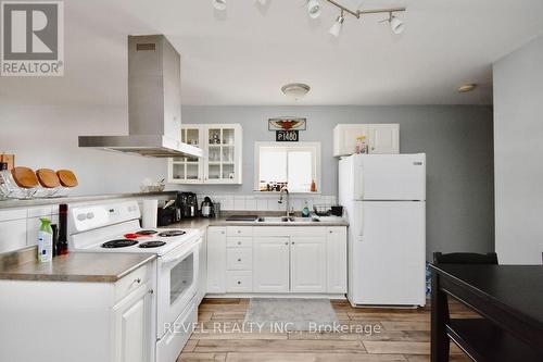 4 Bushey Ave, Essa, ON - Indoor Photo Showing Kitchen With Double Sink