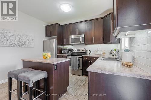 #60 -3320 Meadowgate Blvd, London, ON - Indoor Photo Showing Kitchen With Double Sink With Upgraded Kitchen