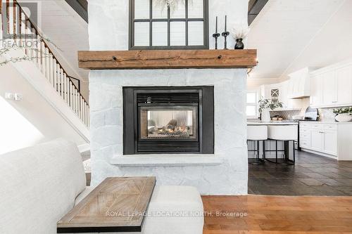 70 Wasaga Sands Drive, Wasaga Beach, ON - Indoor Photo Showing Living Room With Fireplace
