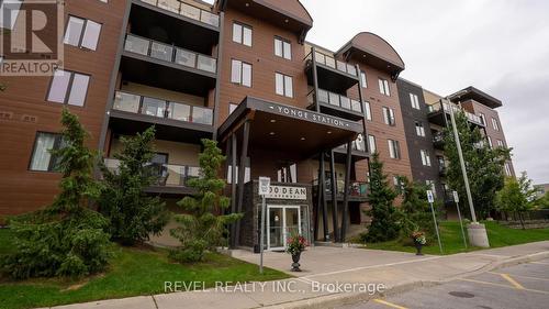 #206 -100 Dean Ave, Barrie, ON - Outdoor With Balcony With Facade