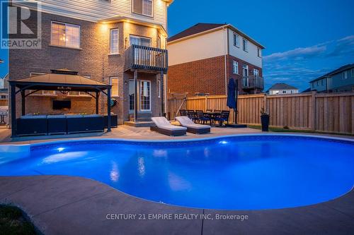 560 Sanderson Cres, Milton, ON - Outdoor With In Ground Pool