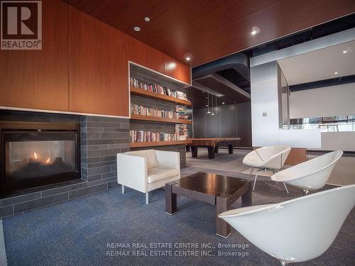 603 - 3 Navy Wharf Court, Toronto, ON - Indoor Photo Showing Living Room With Fireplace