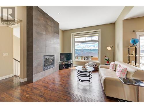 222 Upper Canyon Drive N, Kelowna, BC - Indoor Photo Showing Living Room With Fireplace