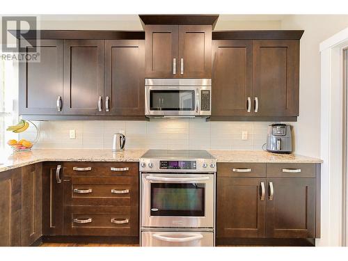 222 Upper Canyon Drive N, Kelowna, BC - Indoor Photo Showing Kitchen With Stainless Steel Kitchen With Upgraded Kitchen