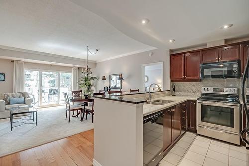 5188 Lakeshore Road|Unit #305, Burlington, ON - Indoor Photo Showing Kitchen With Double Sink
