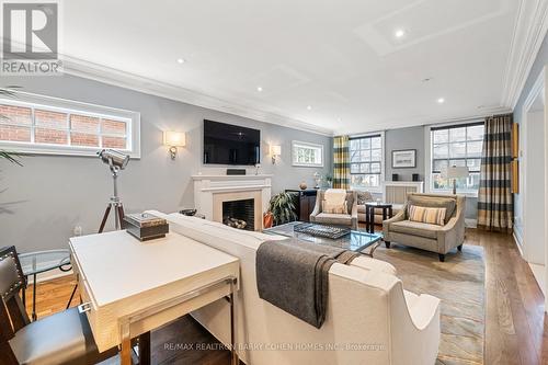 15 Hillholm Rd, Toronto, ON - Indoor Photo Showing Living Room With Fireplace