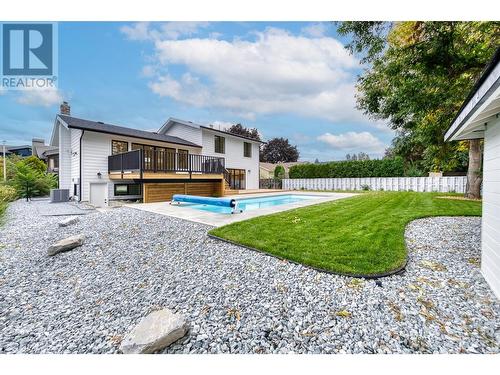 565 Sarsons Road, Kelowna, BC - Outdoor With In Ground Pool With Backyard With Exterior
