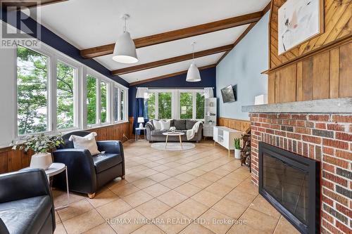 10245 Camelot Drive, Wainfleet, ON - Indoor With Fireplace