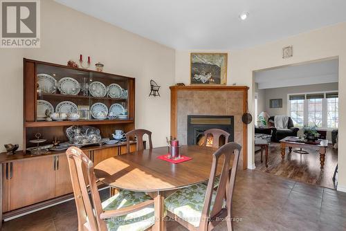 126 Bowman Crt S, Alnwick/Haldimand, ON - Indoor Photo Showing Dining Room With Fireplace