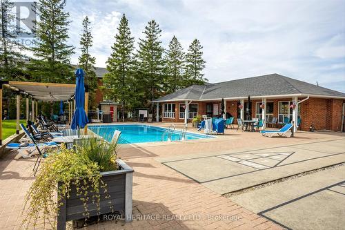 #312 -4 Heritage Way, Kawartha Lakes, ON - Outdoor With In Ground Pool With Deck Patio Veranda