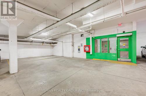 101 - 2379 Central Park Drive, Oakville, ON - Indoor Photo Showing Garage