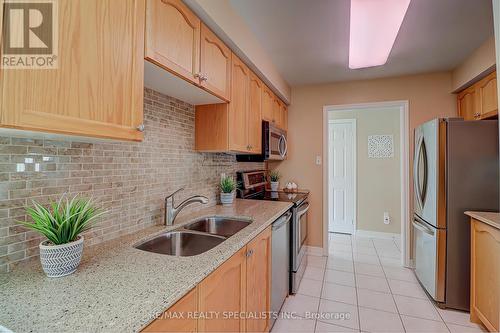 27 Amberhill Trail, Brampton, ON - Indoor Photo Showing Kitchen With Double Sink