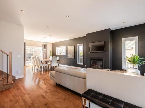 Overall view - 3242 Rue De L'Hamamélis, Saint-Bruno-De-Montarville, QC - Indoor Photo Showing Living Room With Fireplace