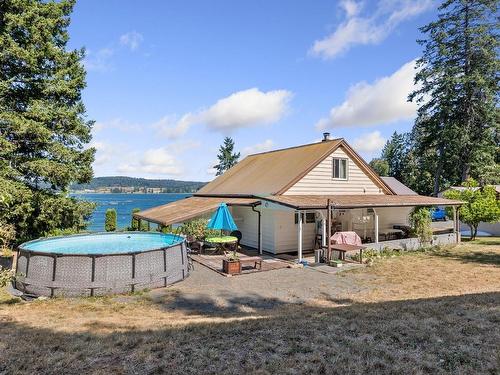 6249 Island Hwy, Union Bay, BC - Outdoor With Above Ground Pool