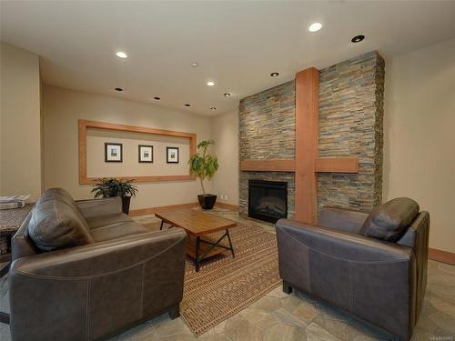 417-1395 Bear Mountain Pkwy, Langford, BC - Indoor Photo Showing Living Room With Fireplace