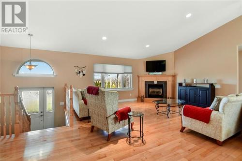 15062 Colonial Drive, Ingleside, ON - Indoor Photo Showing Living Room With Fireplace
