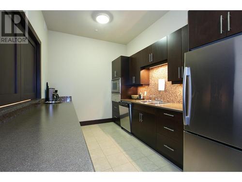 1395 Ellis Street Unit# 1104, Kelowna, BC - Indoor Photo Showing Kitchen With Double Sink