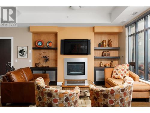 1395 Ellis Street Unit# 1104, Kelowna, BC - Indoor Photo Showing Living Room With Fireplace