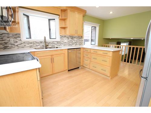 8 Williston Crescent, Mackenzie, BC - Indoor Photo Showing Kitchen With Double Sink