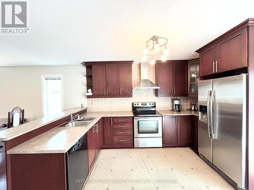 28 55Th Street S, Wasaga Beach, ON - Indoor Photo Showing Kitchen With Double Sink