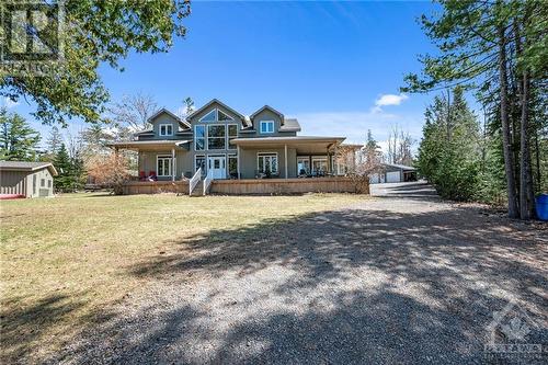 2 Acre property with over 220 feet of shoreline with private boat launch - 254 Lakeshore Road, White Lake, ON - Outdoor With Deck Patio Veranda