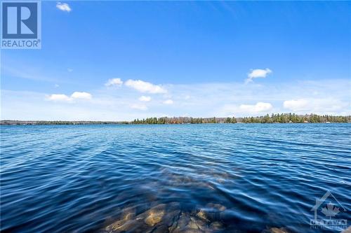 Beautiful views facing west for great sunsets - 254 Lakeshore Road, White Lake, ON - Outdoor With Body Of Water With View