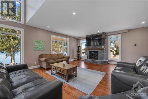 254 Lakeshore Road, White Lake, ON - Indoor Photo Showing Living Room With Fireplace