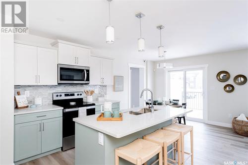 222 Myles Heidt Lane, Saskatoon, SK - Indoor Photo Showing Kitchen With Upgraded Kitchen