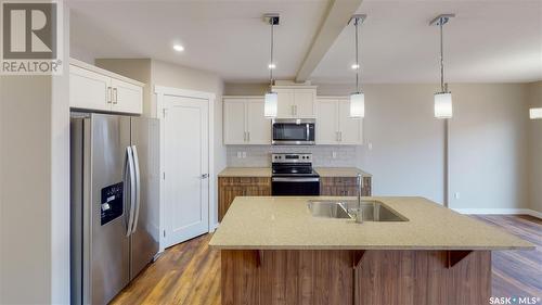 214 Myles Heidt Lane, Saskatoon, SK - Indoor Photo Showing Kitchen With Stainless Steel Kitchen With Double Sink With Upgraded Kitchen