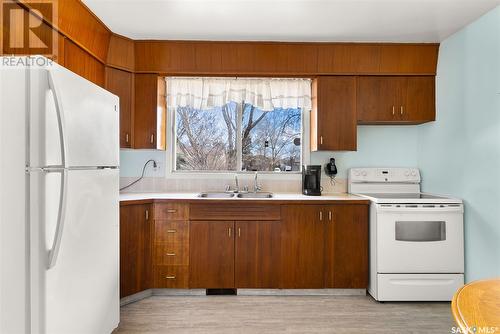 110 Milford Crescent, Regina, SK - Indoor Photo Showing Kitchen With Double Sink
