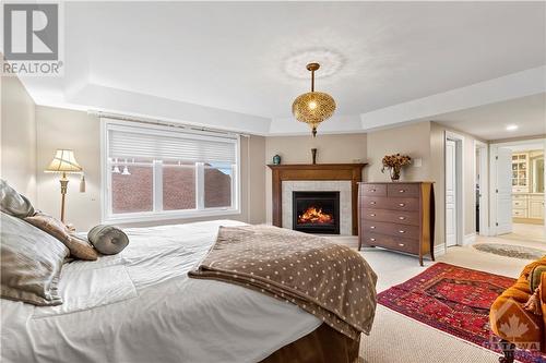 213 Dunston Terrace, Ottawa, ON - Indoor Photo Showing Bedroom With Fireplace
