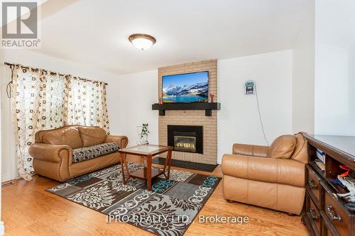 4194 Martlen Cres, Mississauga, ON - Indoor Photo Showing Living Room With Fireplace