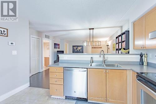#105 -2055 Appleby Line, Burlington, ON - Indoor Photo Showing Kitchen With Stainless Steel Kitchen With Double Sink