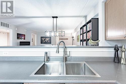 #105 -2055 Appleby Line, Burlington, ON - Indoor Photo Showing Kitchen With Double Sink