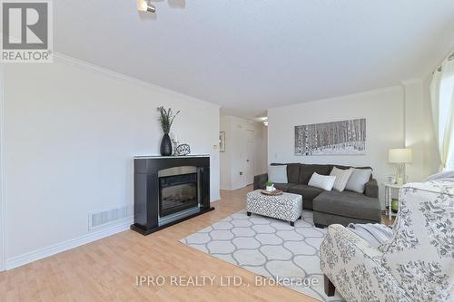 42 Grey Owl St, Halton Hills, ON - Indoor Photo Showing Living Room With Fireplace