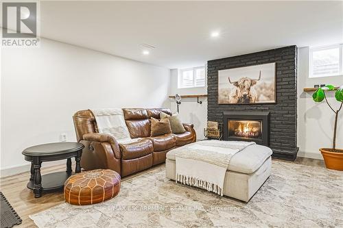 104 Price Ave, Hamilton, ON - Indoor With Fireplace