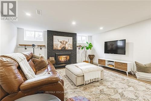 104 Price Ave, Hamilton, ON - Indoor Photo Showing Living Room With Fireplace