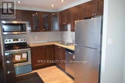1413 - 135 Hillcrest Avenue, Mississauga, ON - Indoor Photo Showing Kitchen With Stainless Steel Kitchen