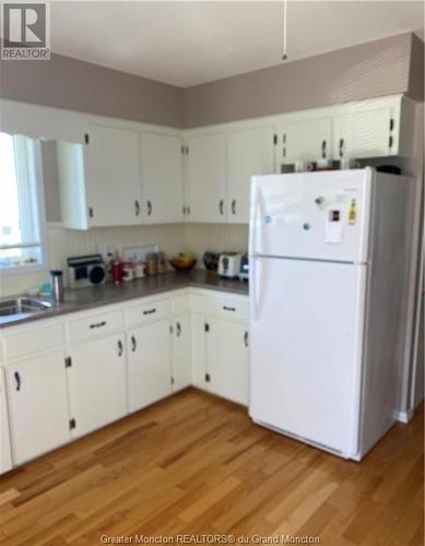 47 Gary Ave, Pointe Du Chene, NB - Indoor Photo Showing Kitchen With Double Sink
