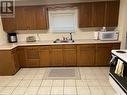 534 3Rd Avenue N, Saskatoon, SK  - Indoor Photo Showing Kitchen With Double Sink 