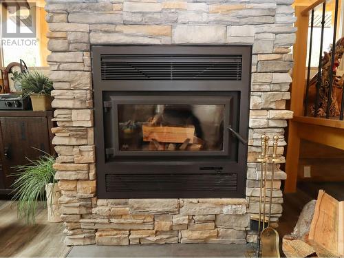 2589 Airstrip Road, Anglemont, BC - Indoor Photo Showing Living Room With Fireplace