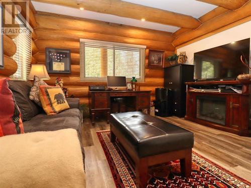 2589 Airstrip Road, Anglemont, BC - Indoor Photo Showing Living Room With Fireplace
