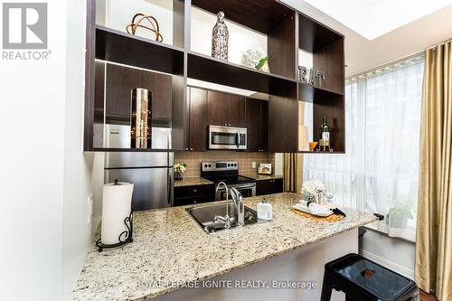 #103 -151 Village Green Sq, Toronto, ON - Indoor Photo Showing Kitchen With Double Sink With Upgraded Kitchen