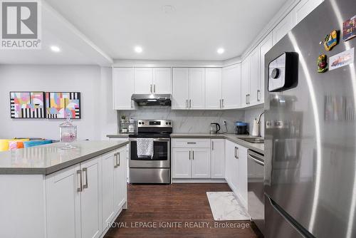 104 - 270 Timberbank Boulevard, Toronto, ON - Indoor Photo Showing Kitchen With Upgraded Kitchen