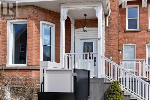 MAIN ENTRANCE - Assistive Feature, "lift" to access building. - 11-13 Garden Street, Brockville, ON - Outdoor With Exterior