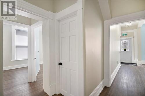 MAIN FLOOR hallway w/views to treatment rooms - 11-13 Garden Street, Brockville, ON - Indoor Photo Showing Other Room