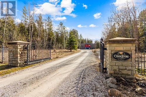 Enter the property through stone & iron gates and a 500ft winding driveway to the main home. - 157 Georgian Drive, Northern Bruce Peninsula, ON - Outdoor