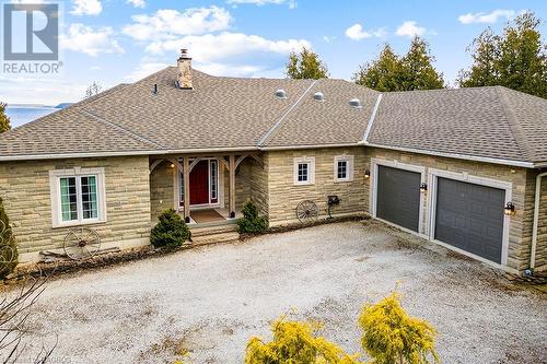 Modern 2,700 sq ft (main floor) raised bungalow with stone exterior. - 157 Georgian Drive, Northern Bruce Peninsula, ON - Outdoor With Body Of Water