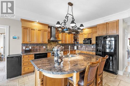 Stunning maple cabinets and granite surfaces. - 157 Georgian Drive, Northern Bruce Peninsula, ON - Indoor Photo Showing Kitchen
