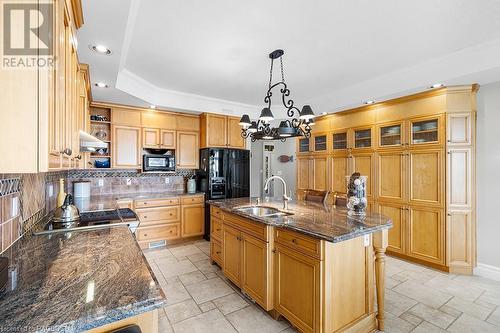 Custom finishes and an abundance of storage. - 157 Georgian Drive, Northern Bruce Peninsula, ON - Indoor Photo Showing Kitchen With Double Sink